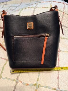 Dooney & Bourke Black Leather Shoulder Bag with Brown Trim and Orange Accent
